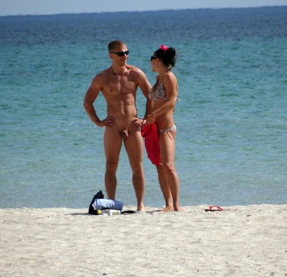 Naked men on a common beach