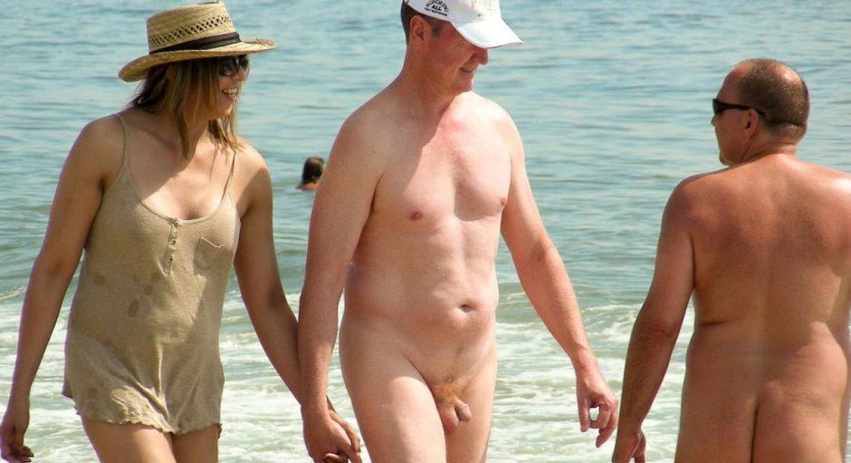 Naked men and women on the beach
