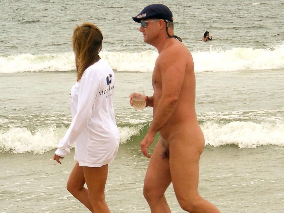Dressed girls erection on the beach