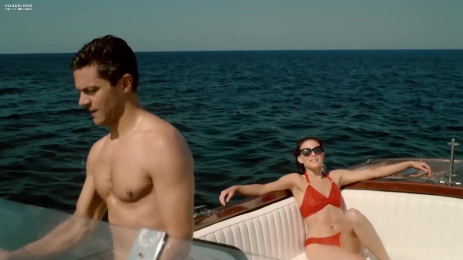 Lara Pulver in a swimsuit