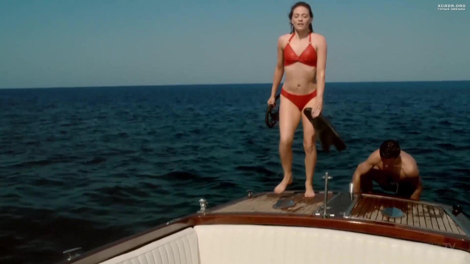 Lara Pulver in a swimsuit