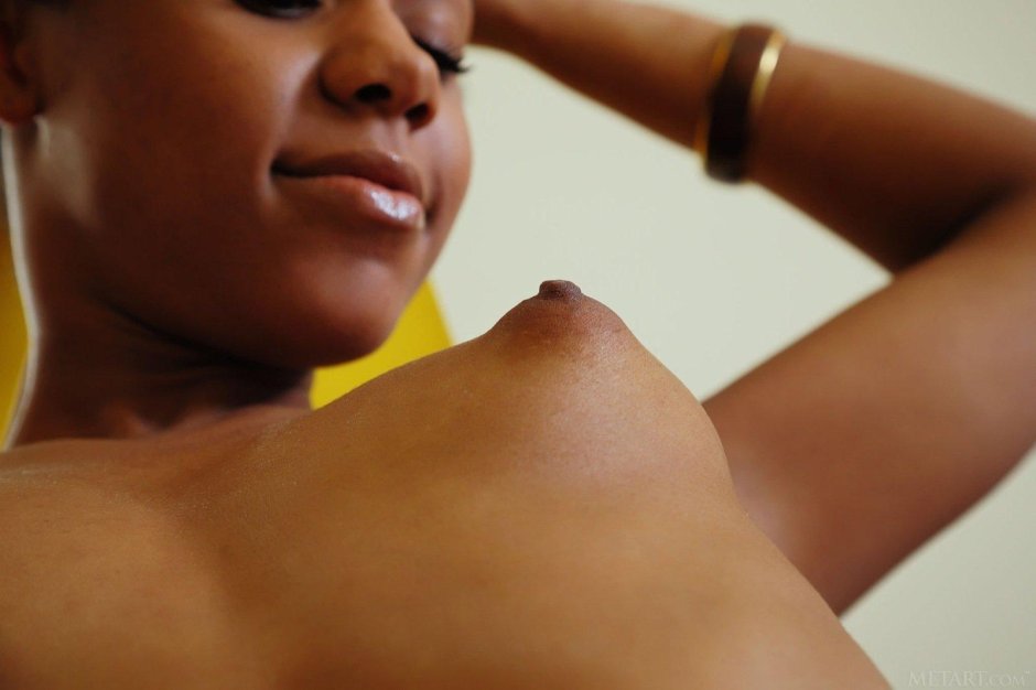 Breasts of black woman close -up