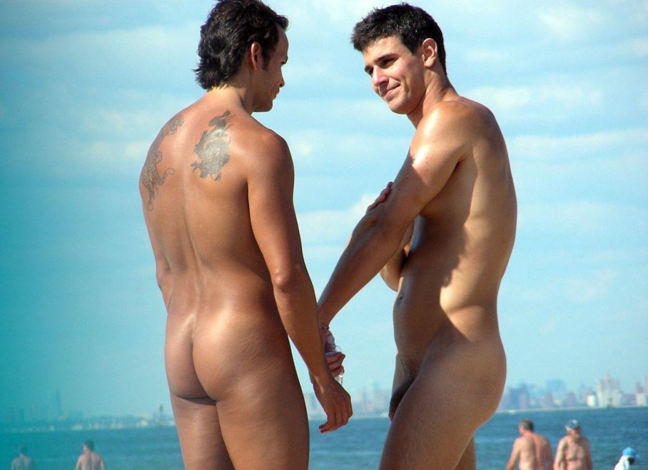 Beautiful naked men on the beach