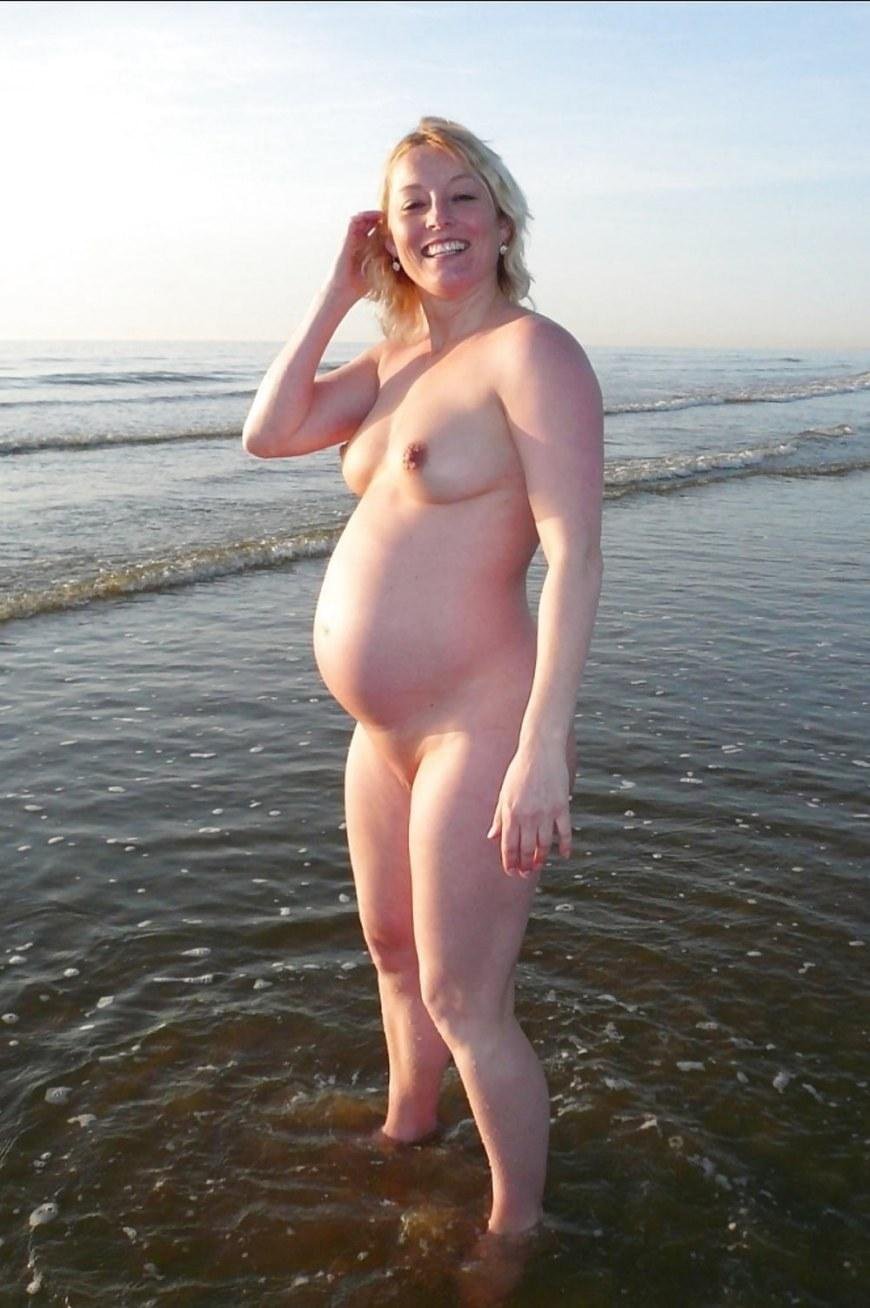 Pregnant nudists on the beach