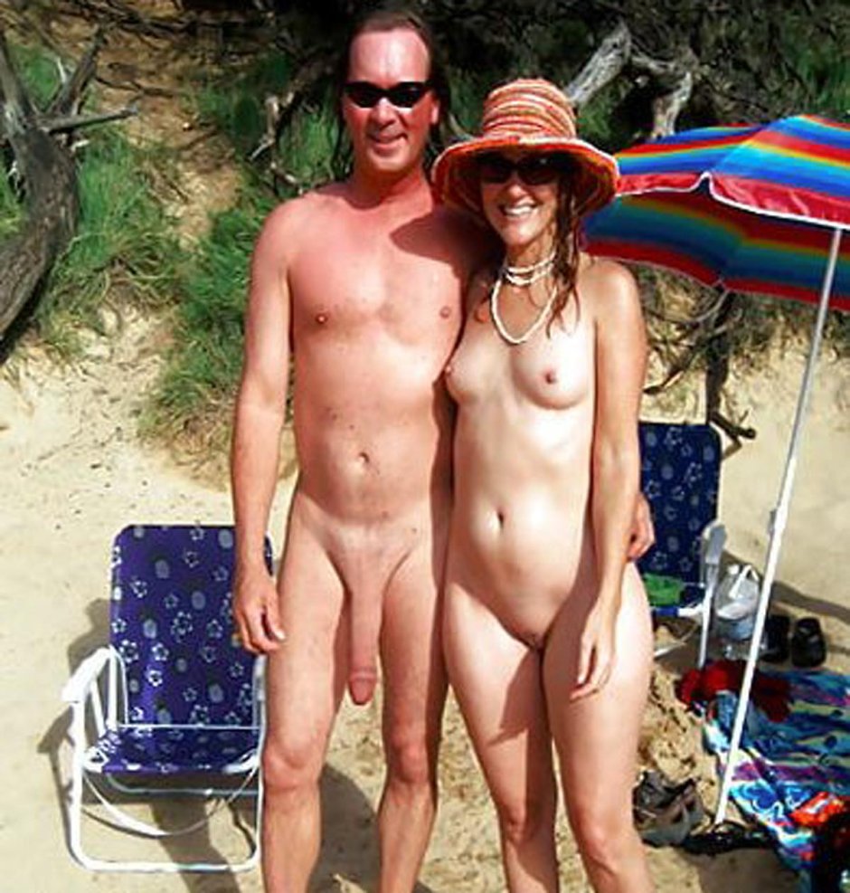 Naked pairs with an erection on the beach