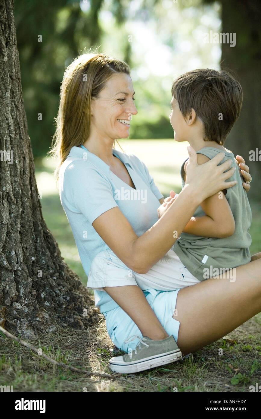Mother sitting sons lap