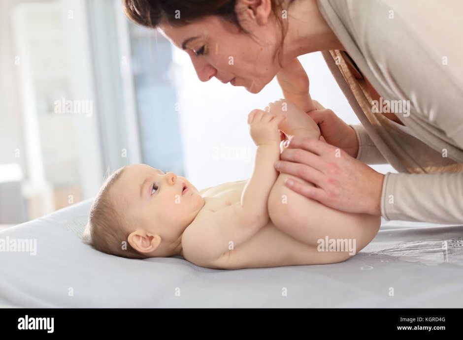 The child is pressed to his mother